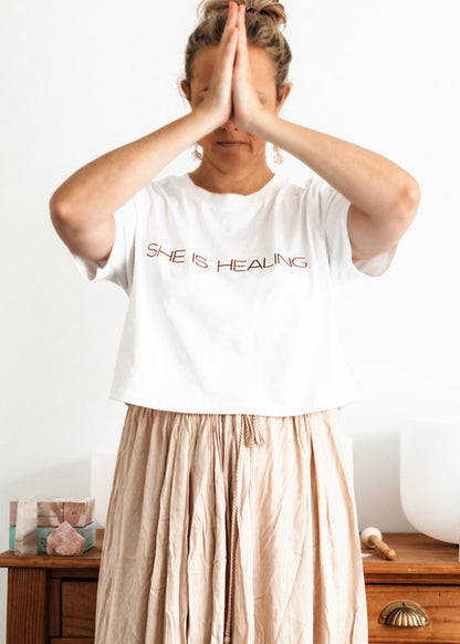 SHE IS. healing tee