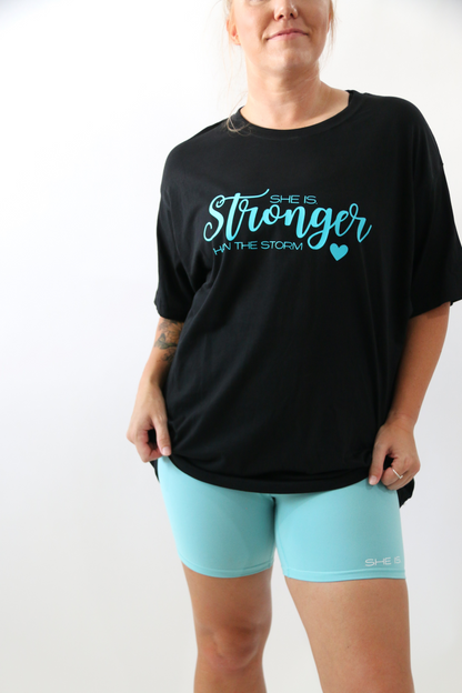 SHE IS. STRONGER THAN THE STORM TEE