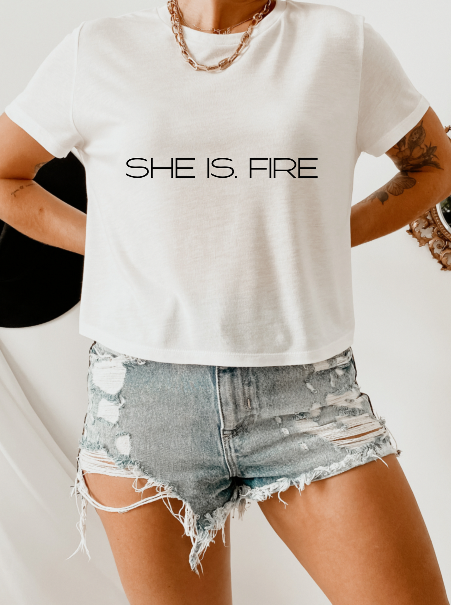 SHE IS. FIRE Cropped Tee